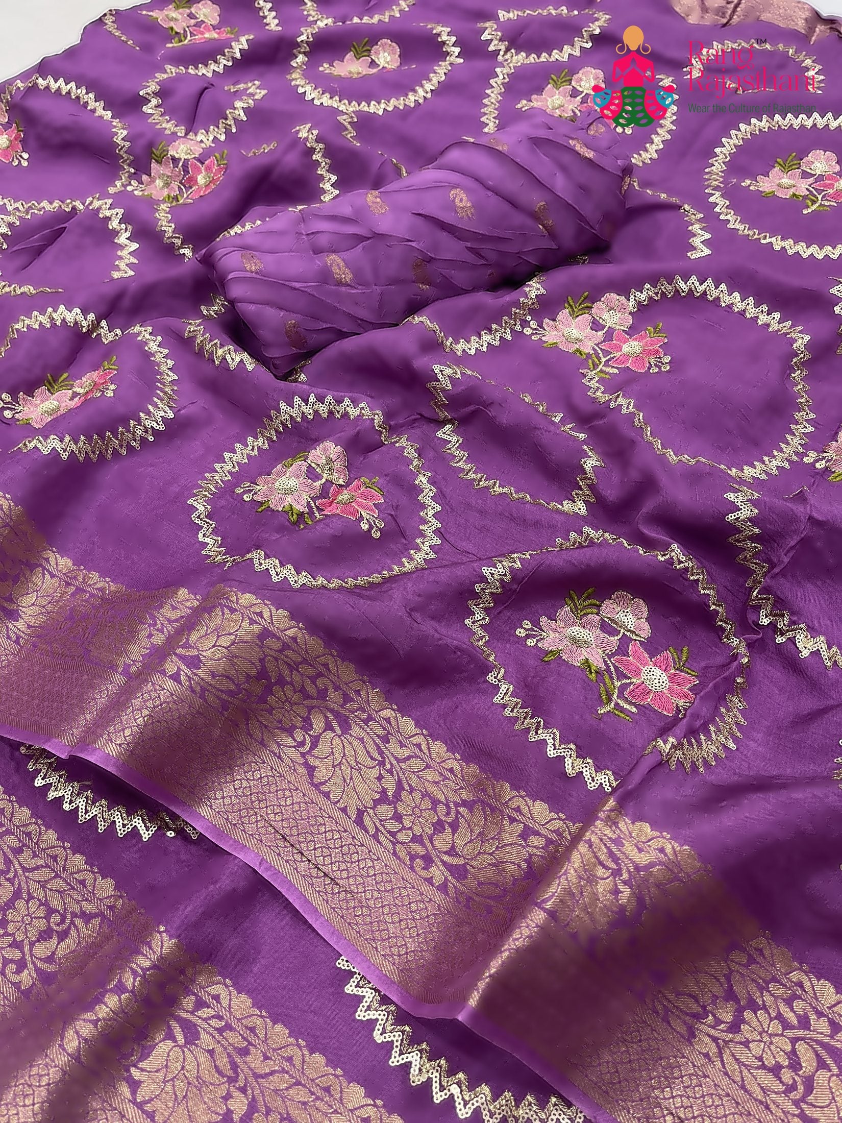 close up detailing of purple pure russsian silk sequin saree 