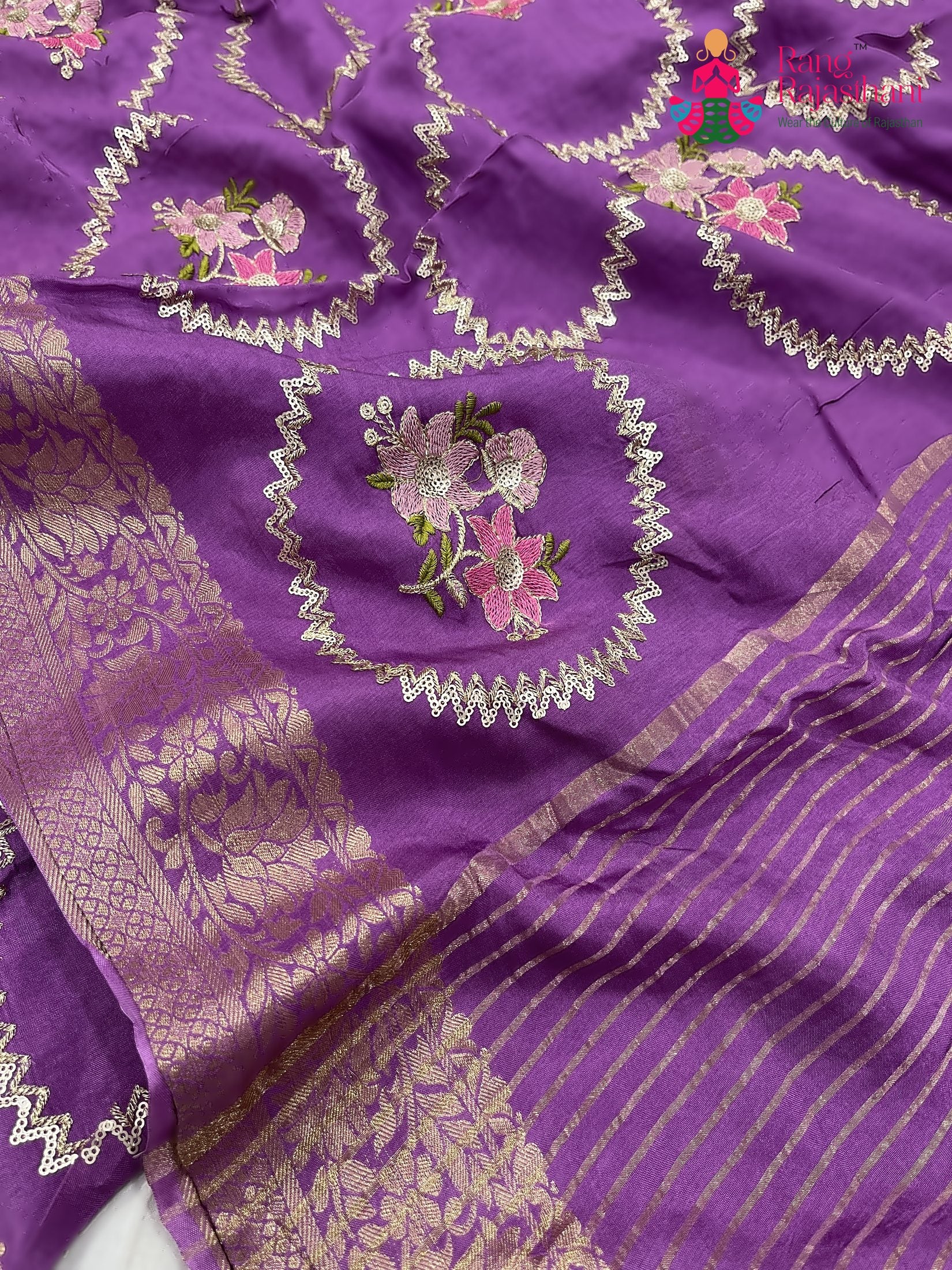 pallu detailing of purple pure russsian silk sequin saree 