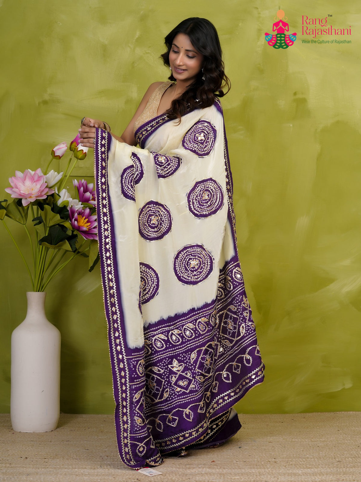 pallu detailing of purple pure tissue silk gota patti saree