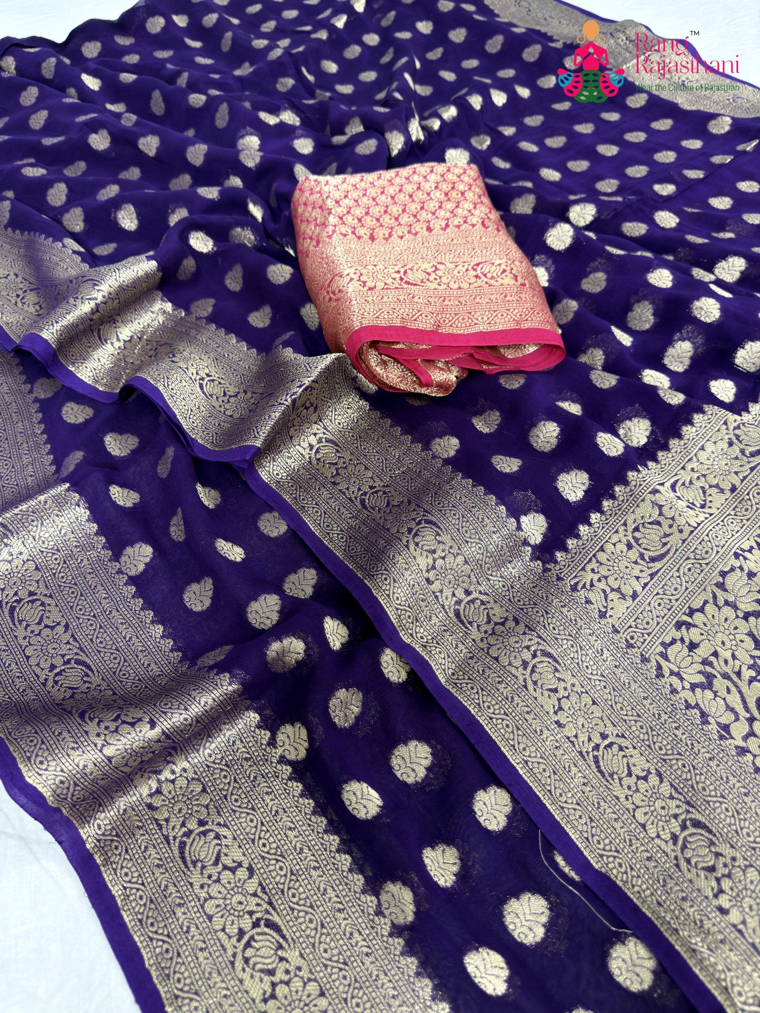 border detailing of purple soft georgette banarasi zari weave saree