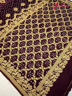border detail of burgundy saree