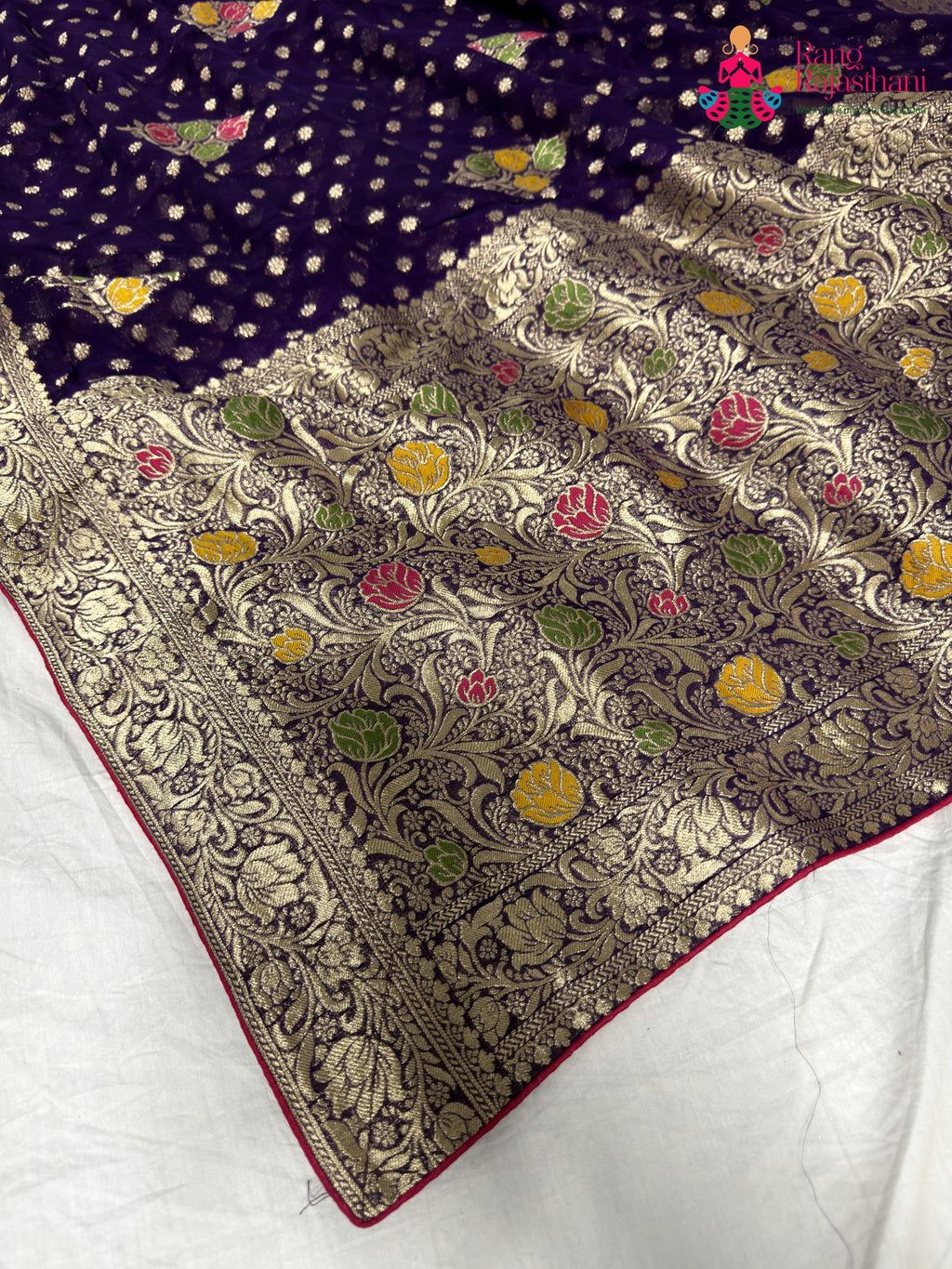 pallu detailing of purple soft georgette meenakari zari saree