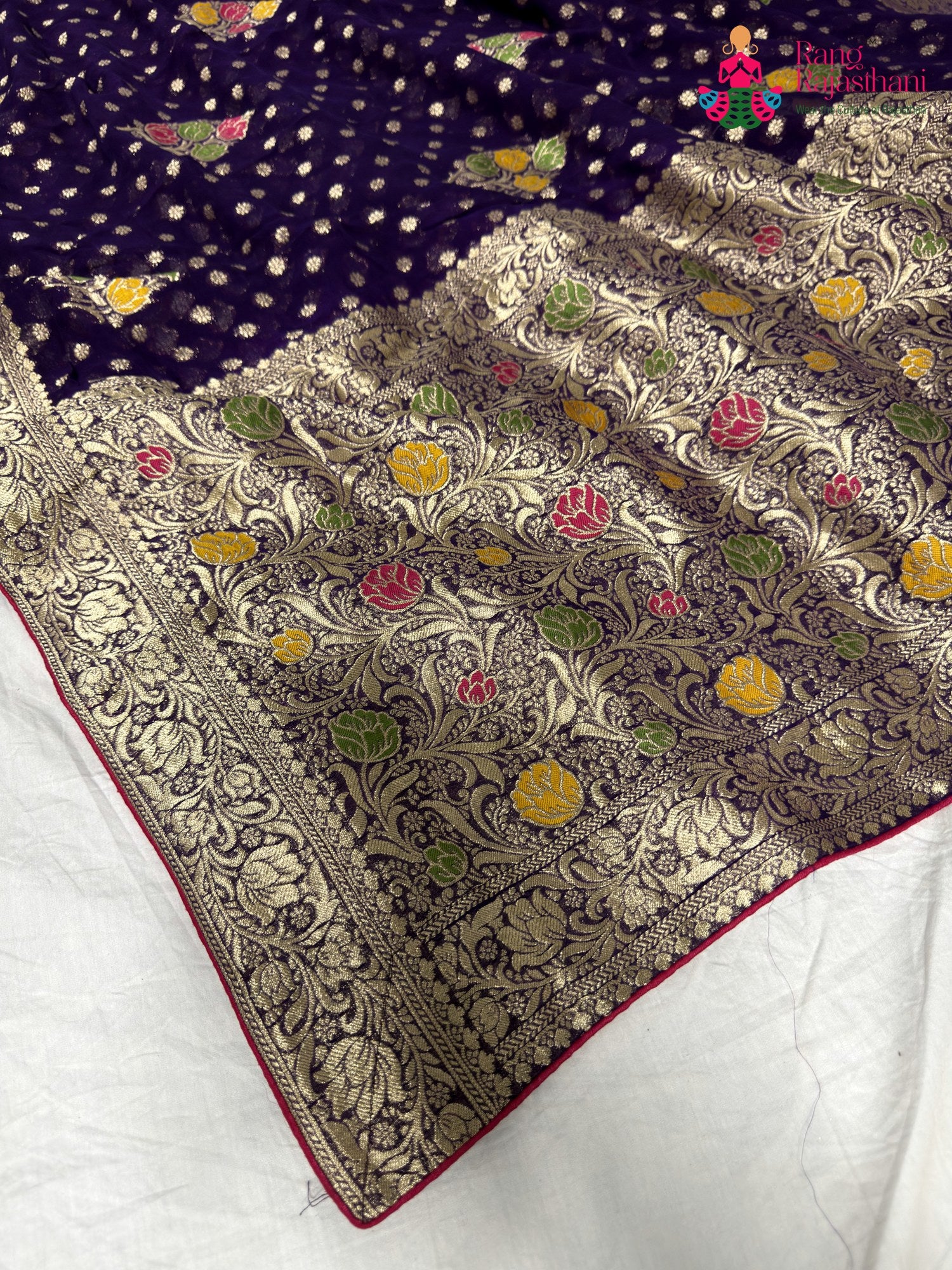 pallu detailing of purple soft georgette meenakari zari saree