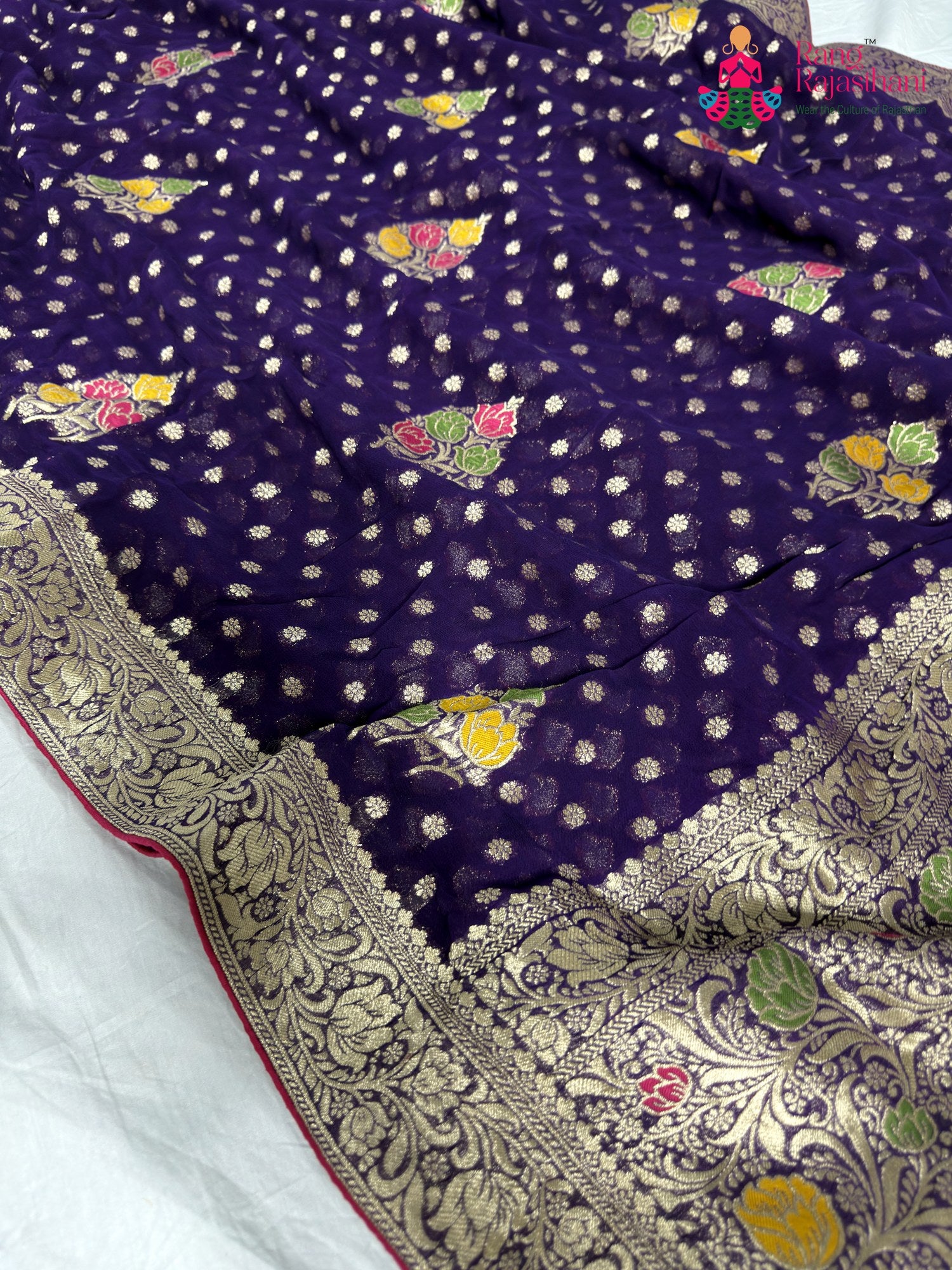 close up detailing of purple soft georgette meenakari zari saree