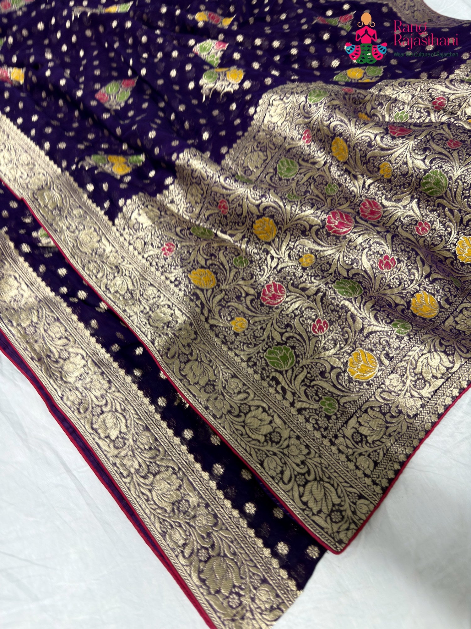 border detailing of purple soft georgette meenakari zari saree