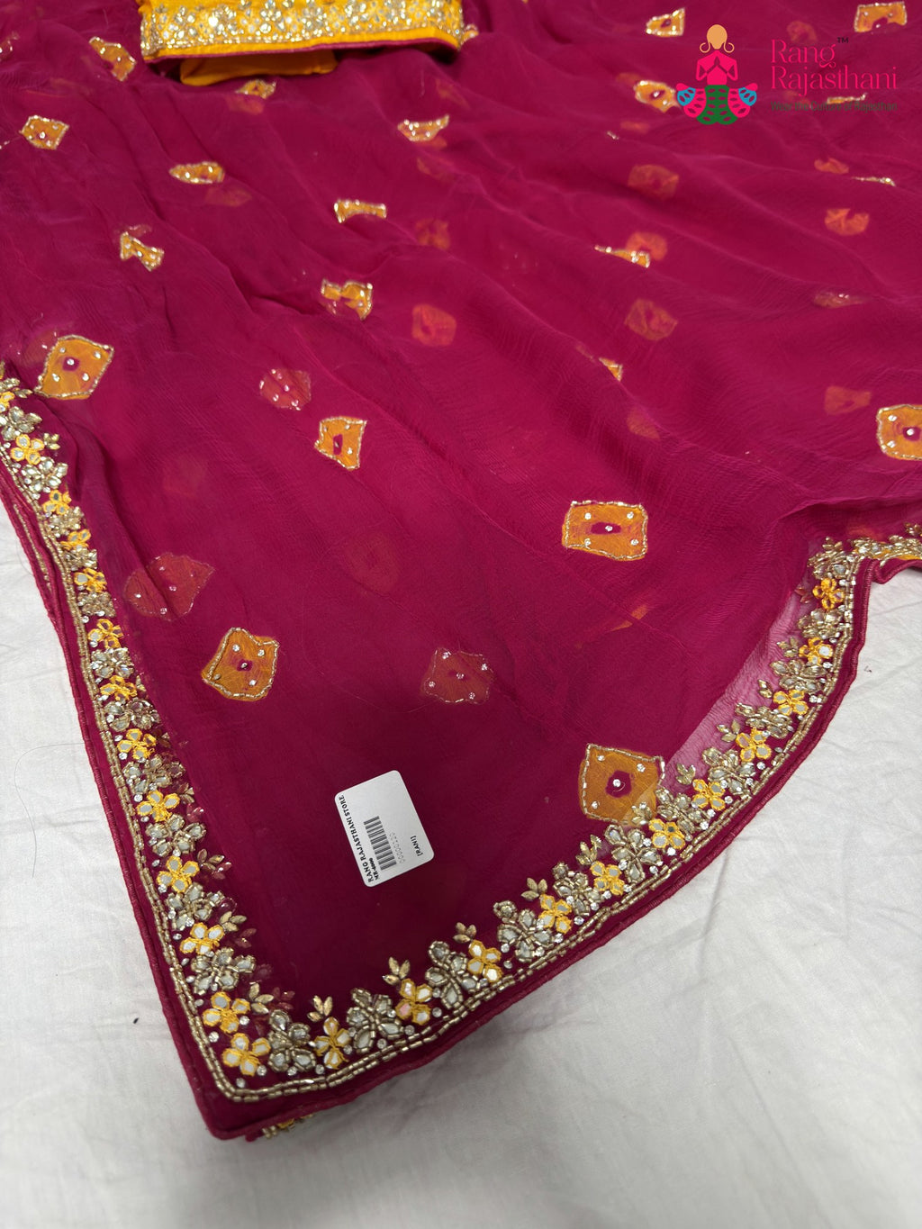 close up detailing of rani chiffon hand embellishment saree