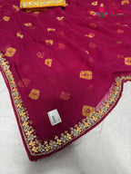 close up detailing of rani chiffon hand embellishment saree
