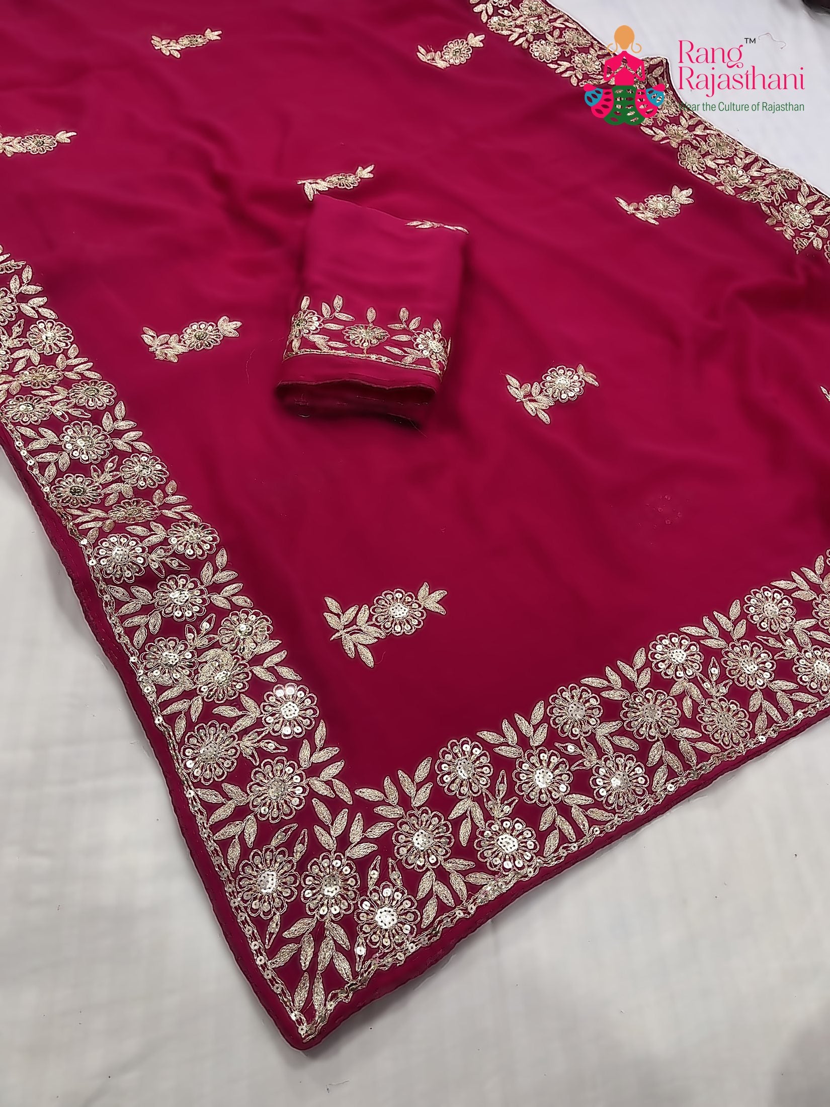 pallu detailing of rani chiffon zari embroidery saree