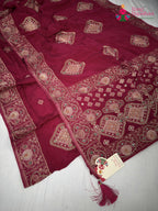 close up detailing of rani chinnon hand embellishment saree