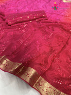 close up detailing of rani chinnon resham embroidery saree