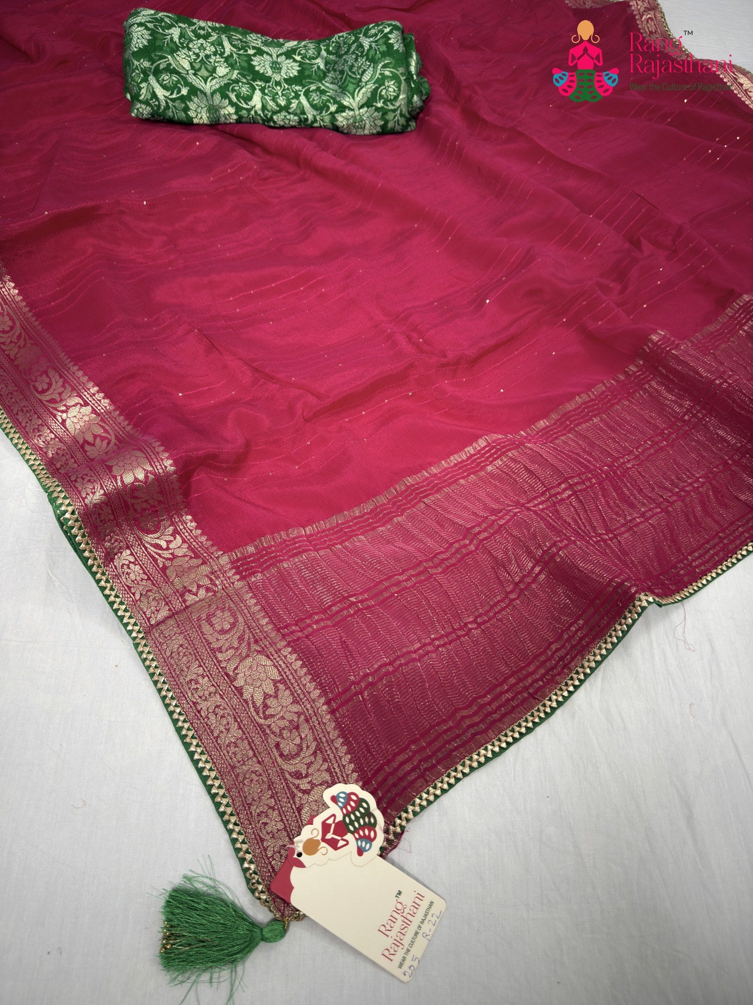 close up detailing of rani chinnon saree