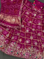 border detail of rani gajji silk bandhani lehenga chunni