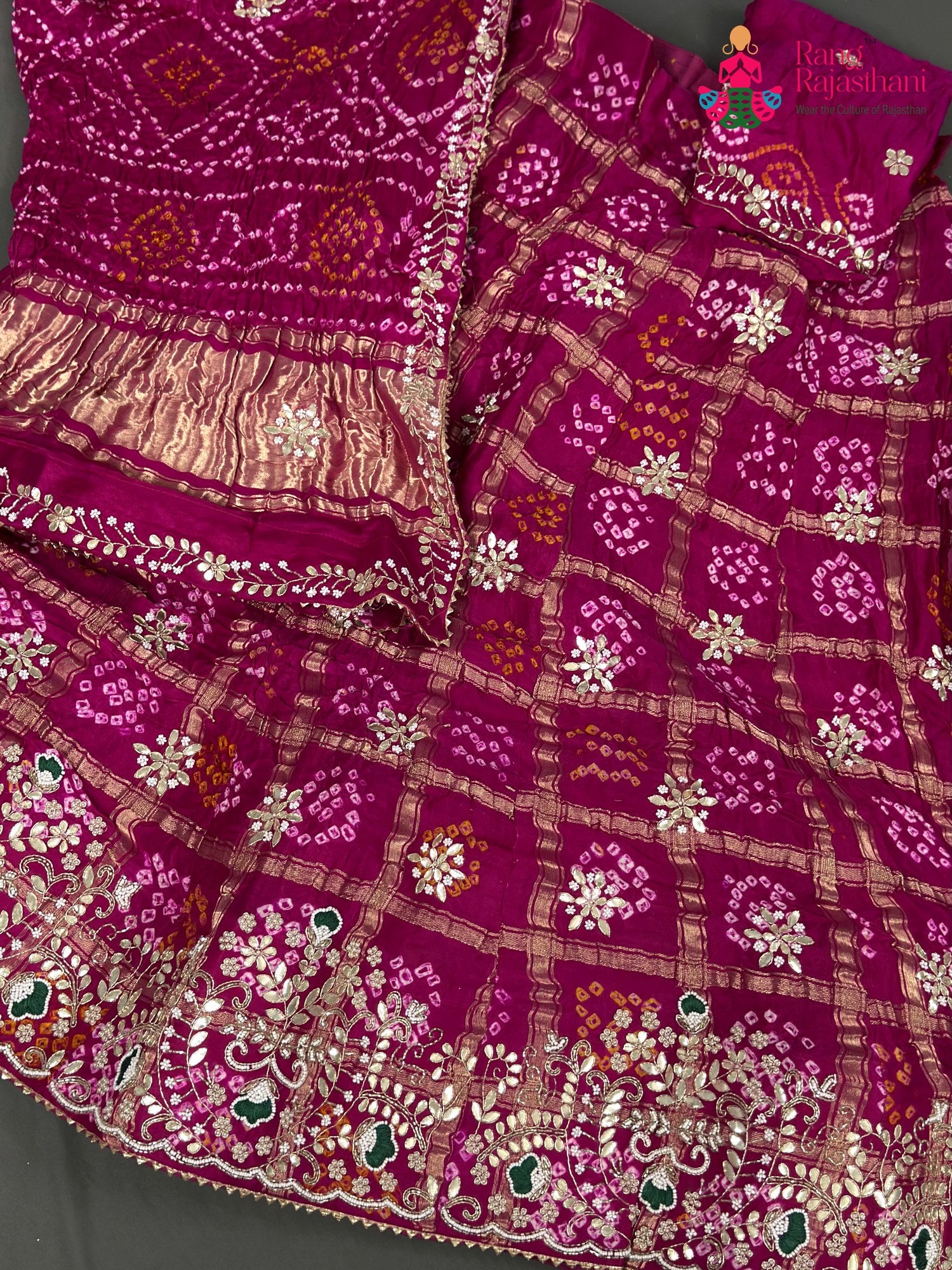 border detail of rani gajji silk bandhani lehenga chunni