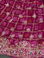 chunni detail of rani gajji silk bandhani lehenga chunni