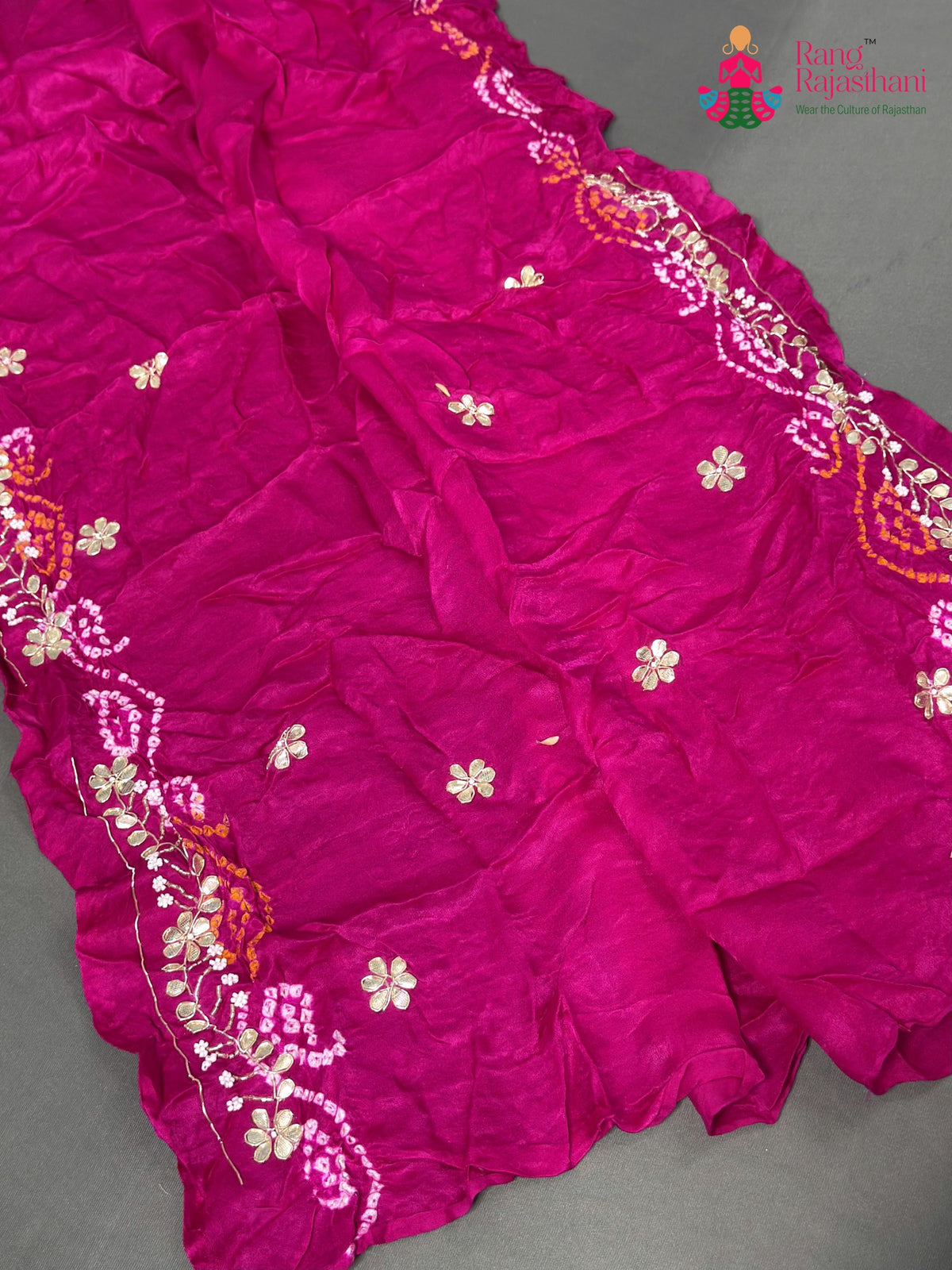 close up view of rani gajji silk bandhani lehenga chunni