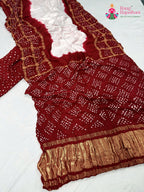 border detailing of rani gajji silk bandhani saree