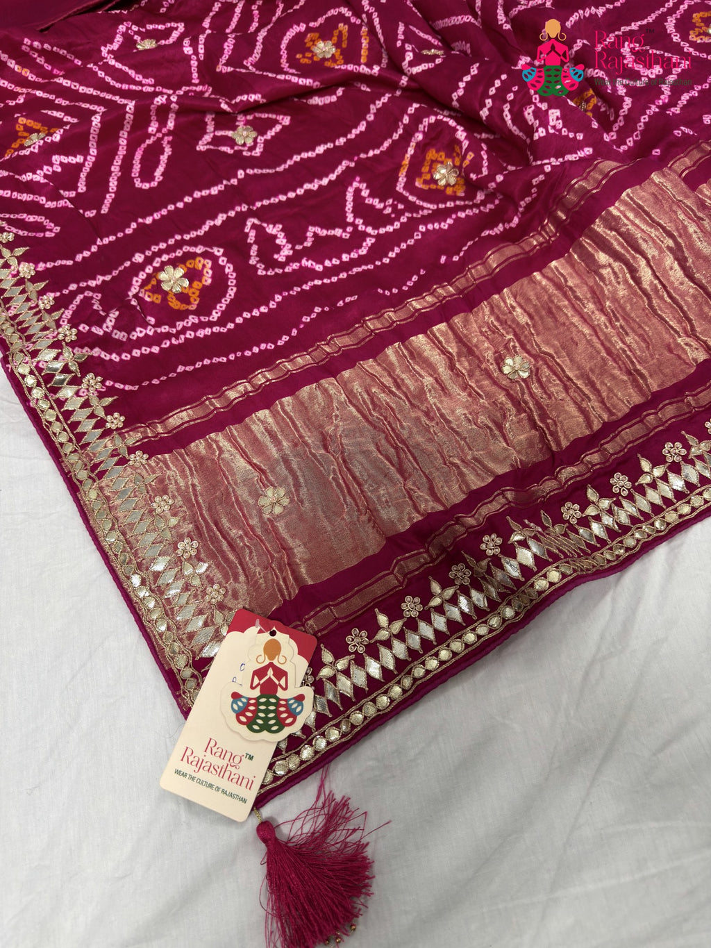 close up detailing of rani gajji silk gota patti saree