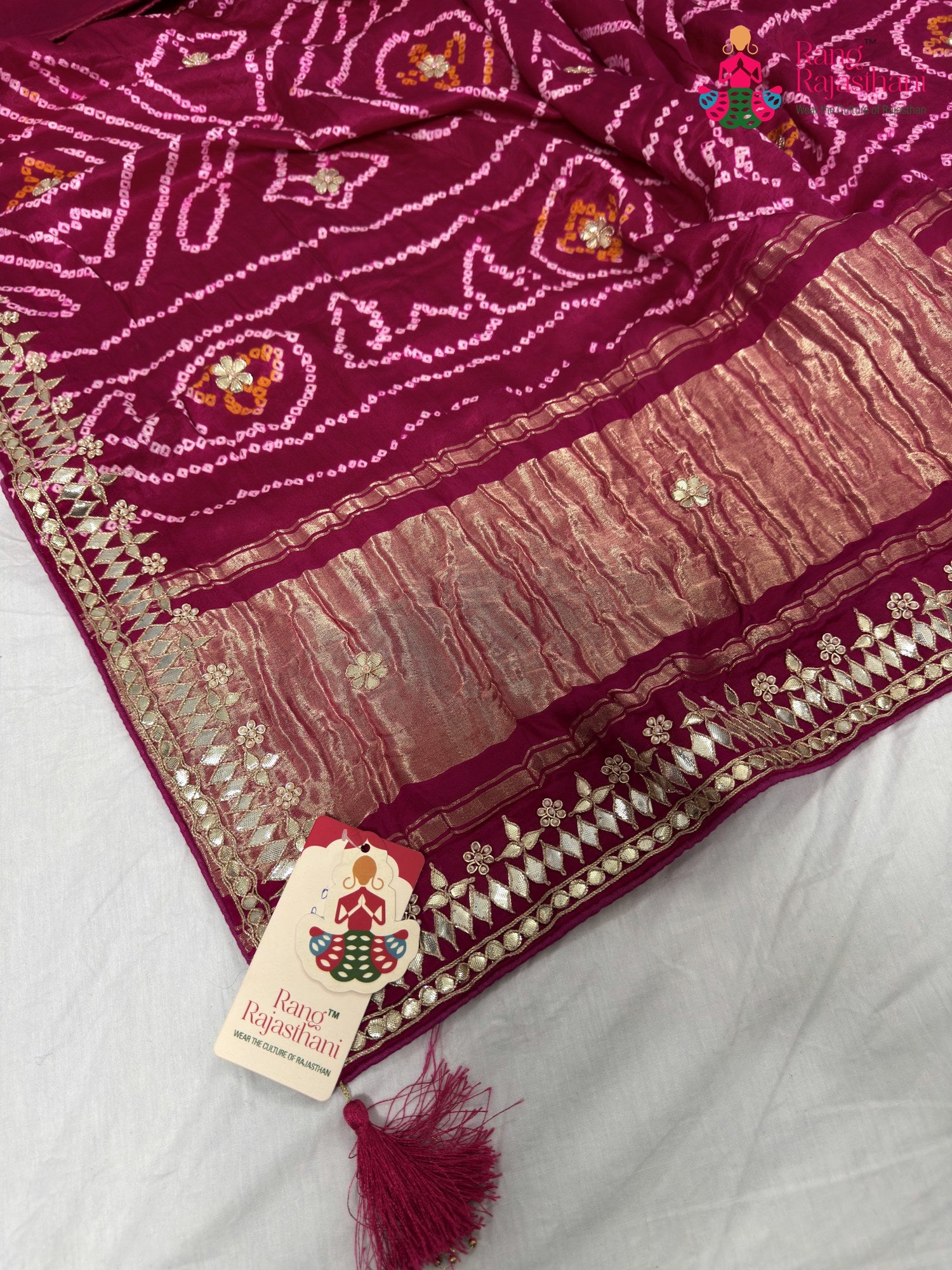 close up detailing of rani gajji silk gota patti saree