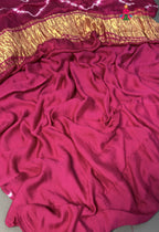 close up detailing of rani modal ajrakh print saree