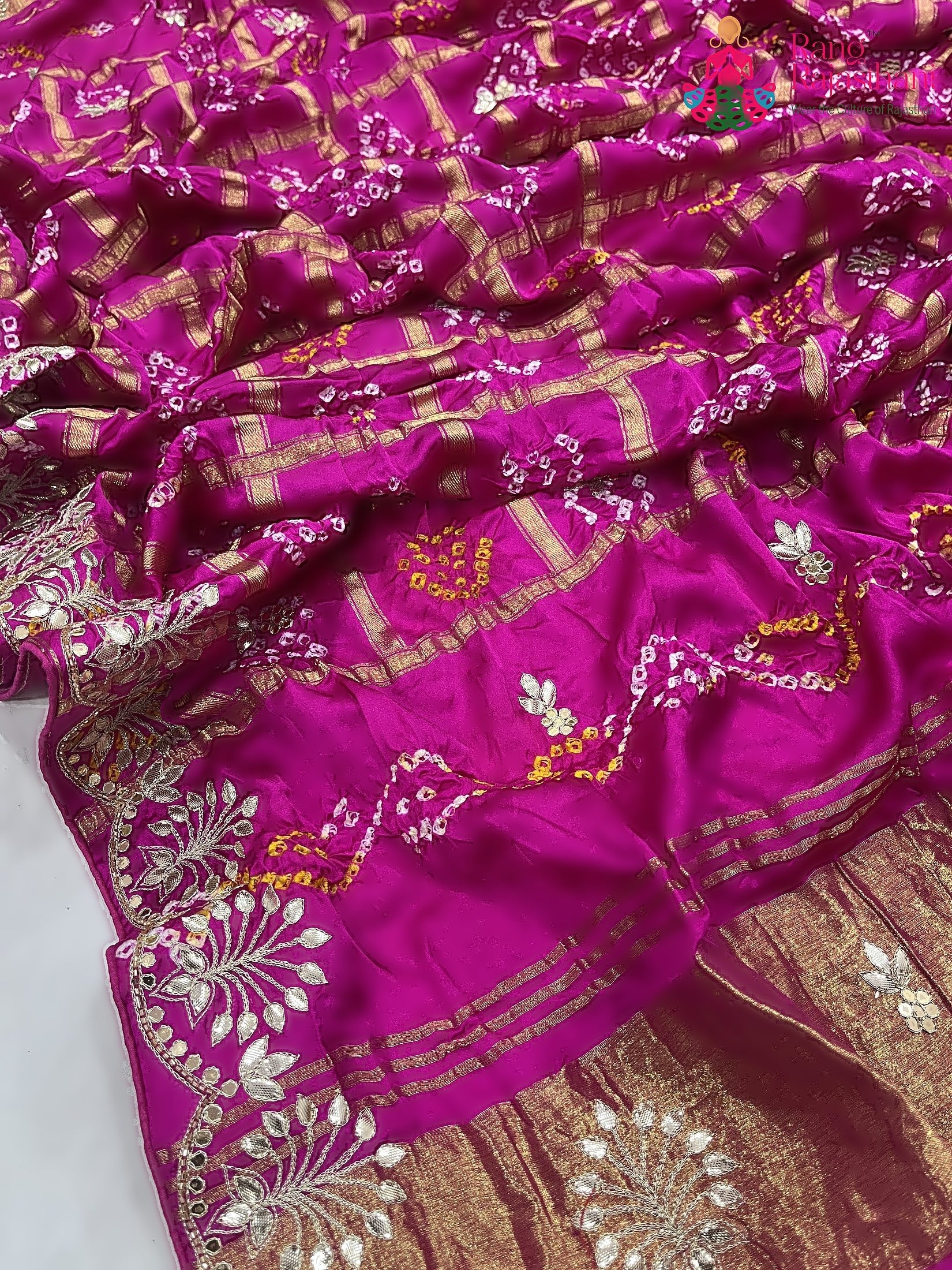 close up detailing of rani khaddi gota patti saree 