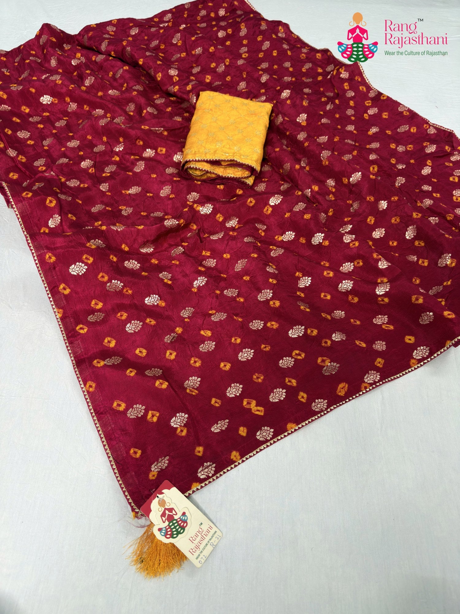 rani pure dola silk bandhani saree for haldi ceremony by Rang Rajasthani