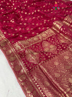 close up detailing of rani pure ho silk banarasi zari weave saree