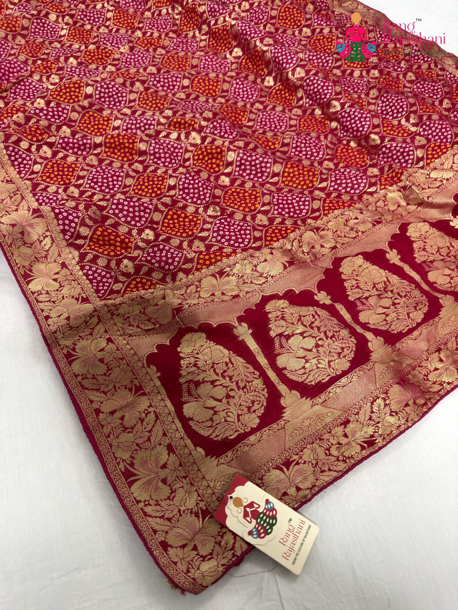 pallu detailing of rani pure khaddi georgette bandhani saree