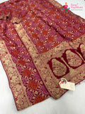 close up detailing of rani pure khaddi georgette bandhani saree
