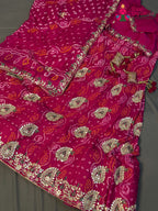 border detail of rani pure ojariya bandhani lehenga chunni
