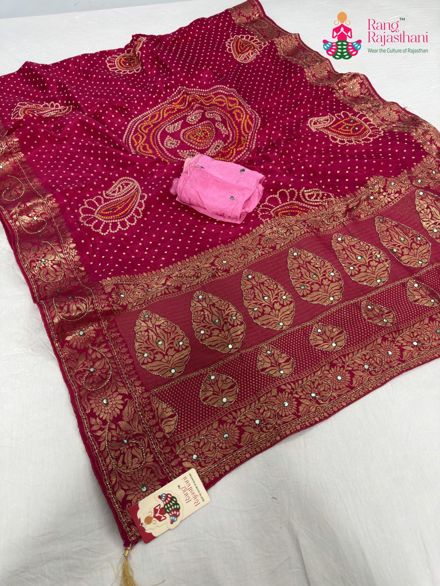 close up detailing of rani pure russian silk bandhani saree