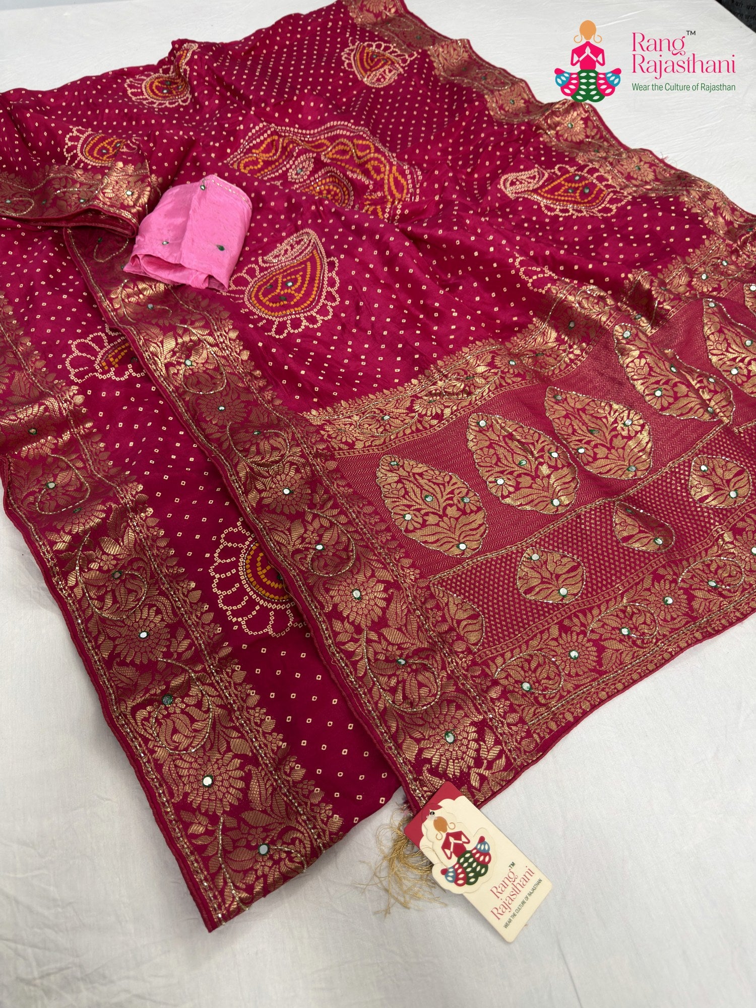 border detailing of rani pure russian silk bandhani saree