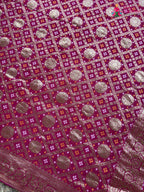 border detail of rani soft georgette banarasi zari weave gharchola saree