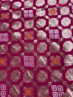 pallu detailing of rani soft georgette banarasi zari weave gharchola saree