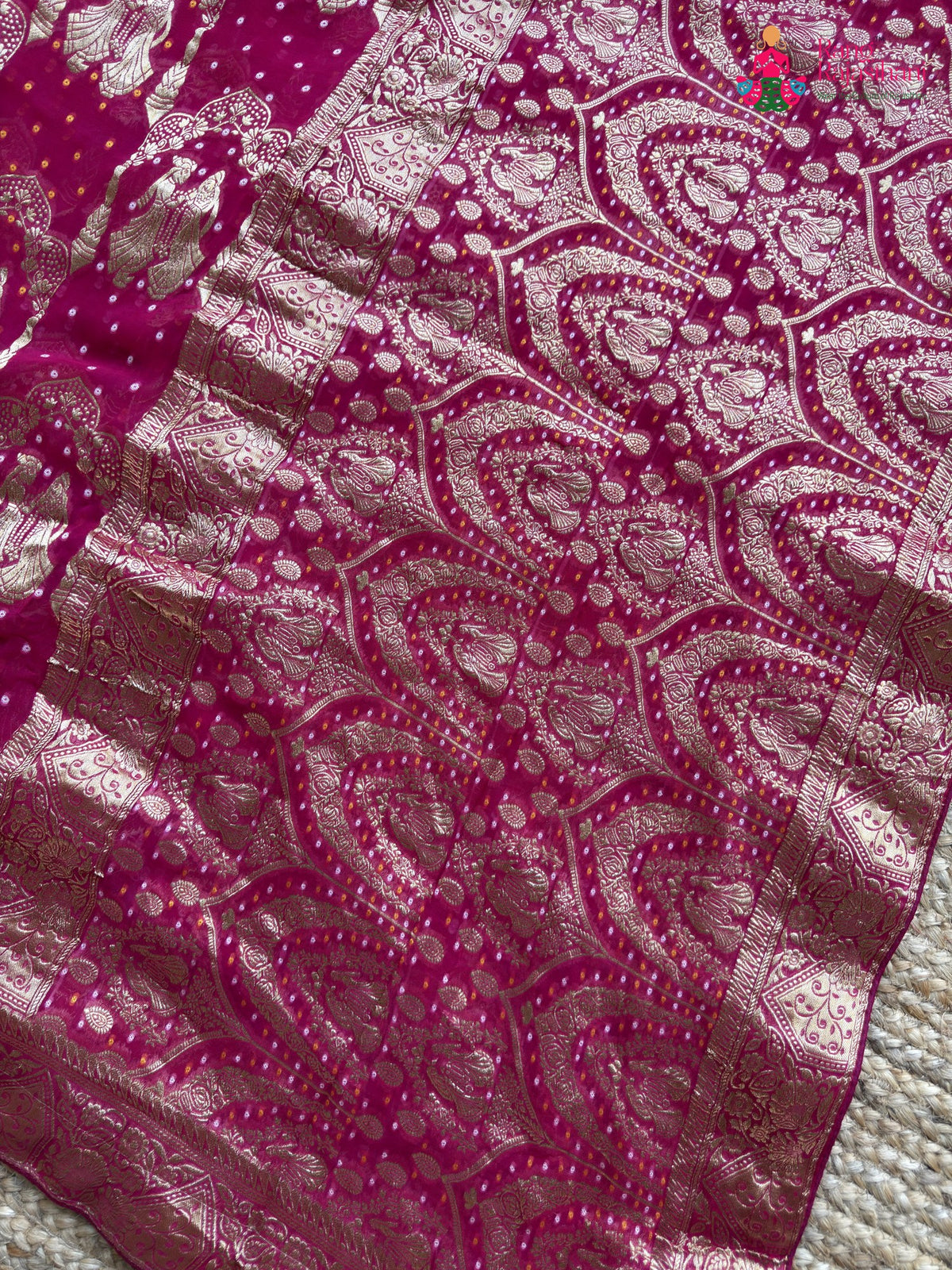pallu detailing of rani soft georgette banarasi zari weave gharchola saree