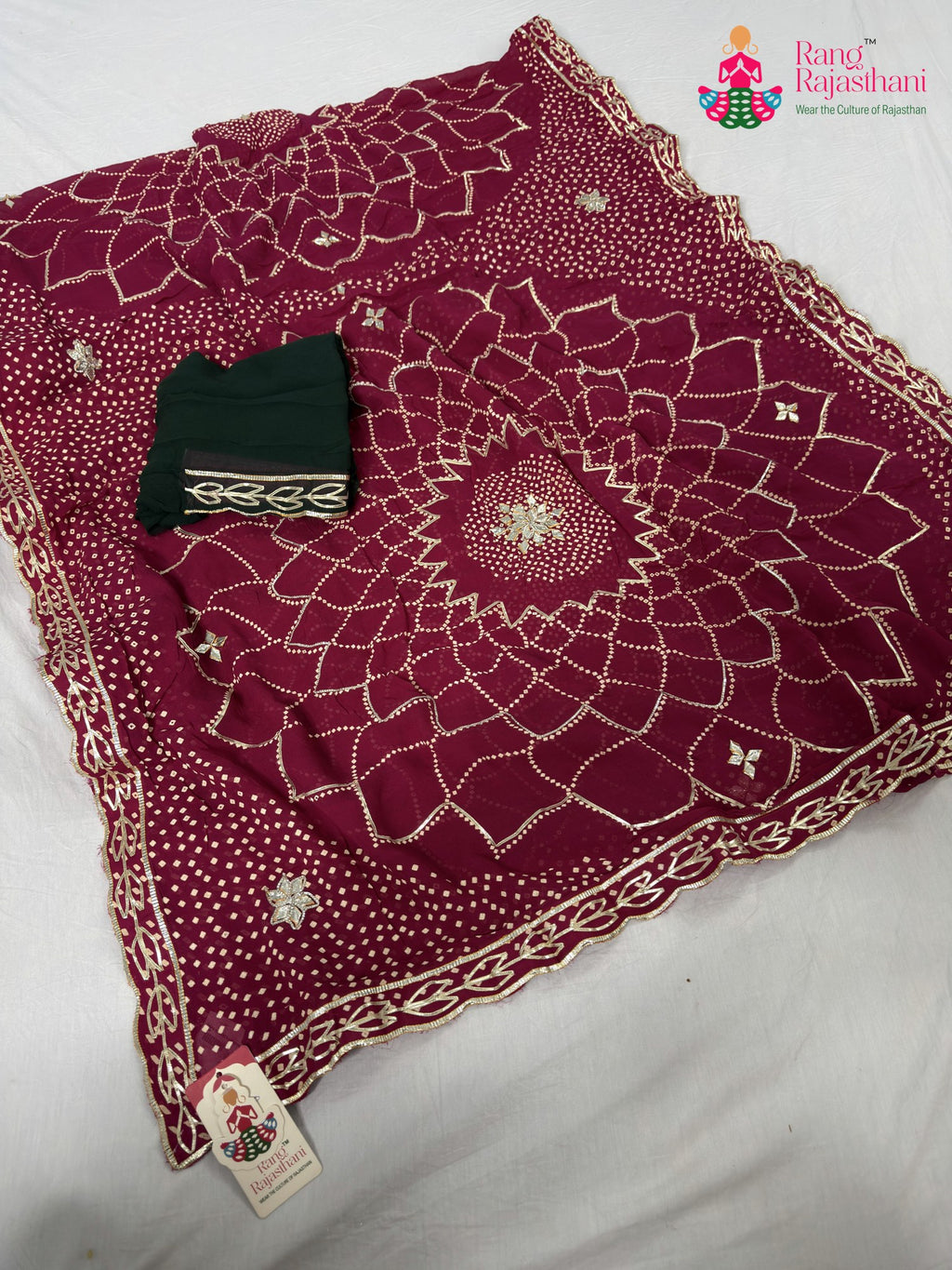 pallu detailing of rani soft georgette bandhani saree