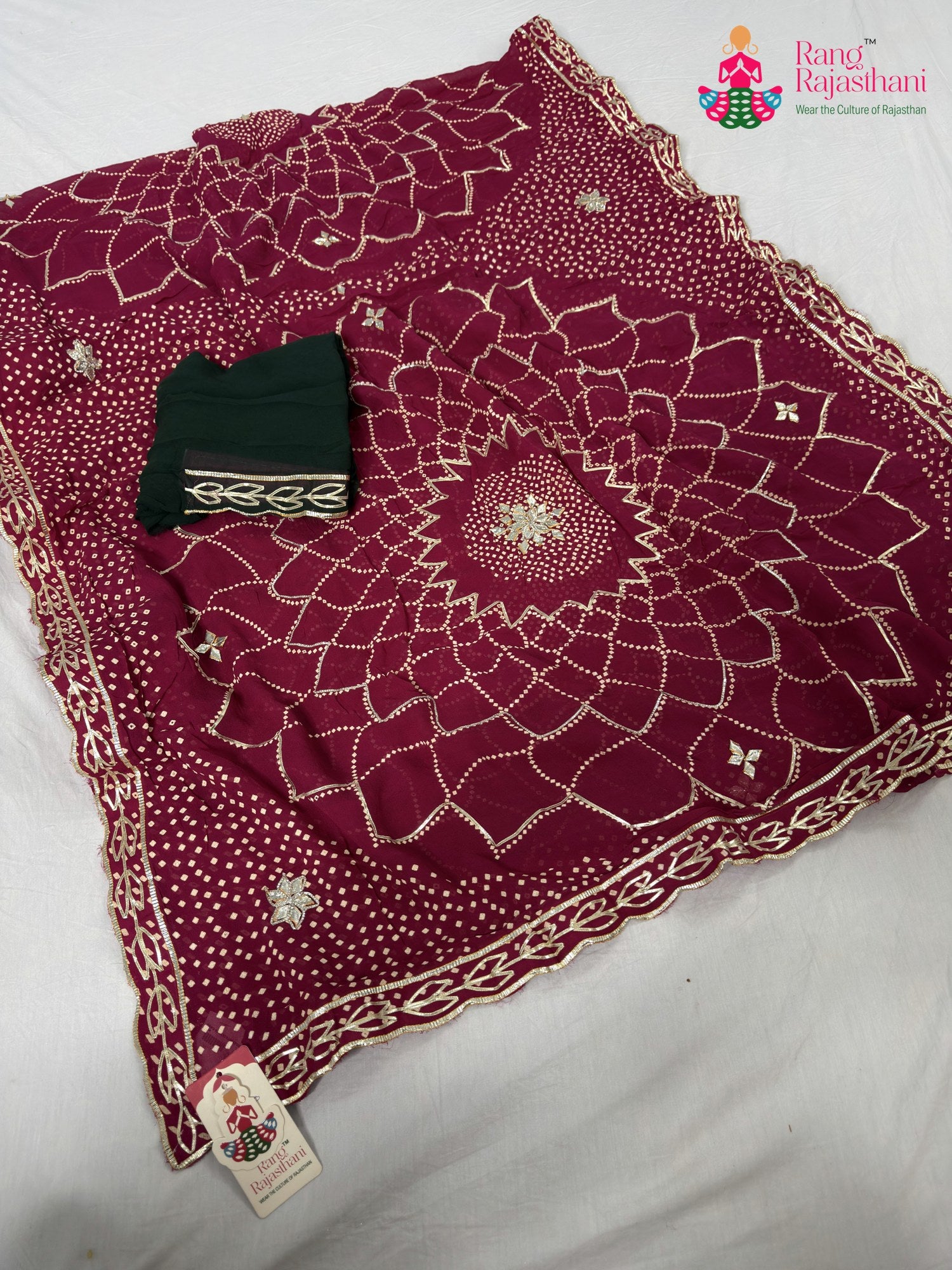 pallu detailing of rani soft georgette bandhani saree