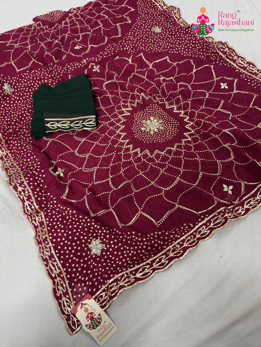 close up detailing of rani soft georgette bandhani saree