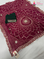 close up detailing of rani soft georgette bandhani saree