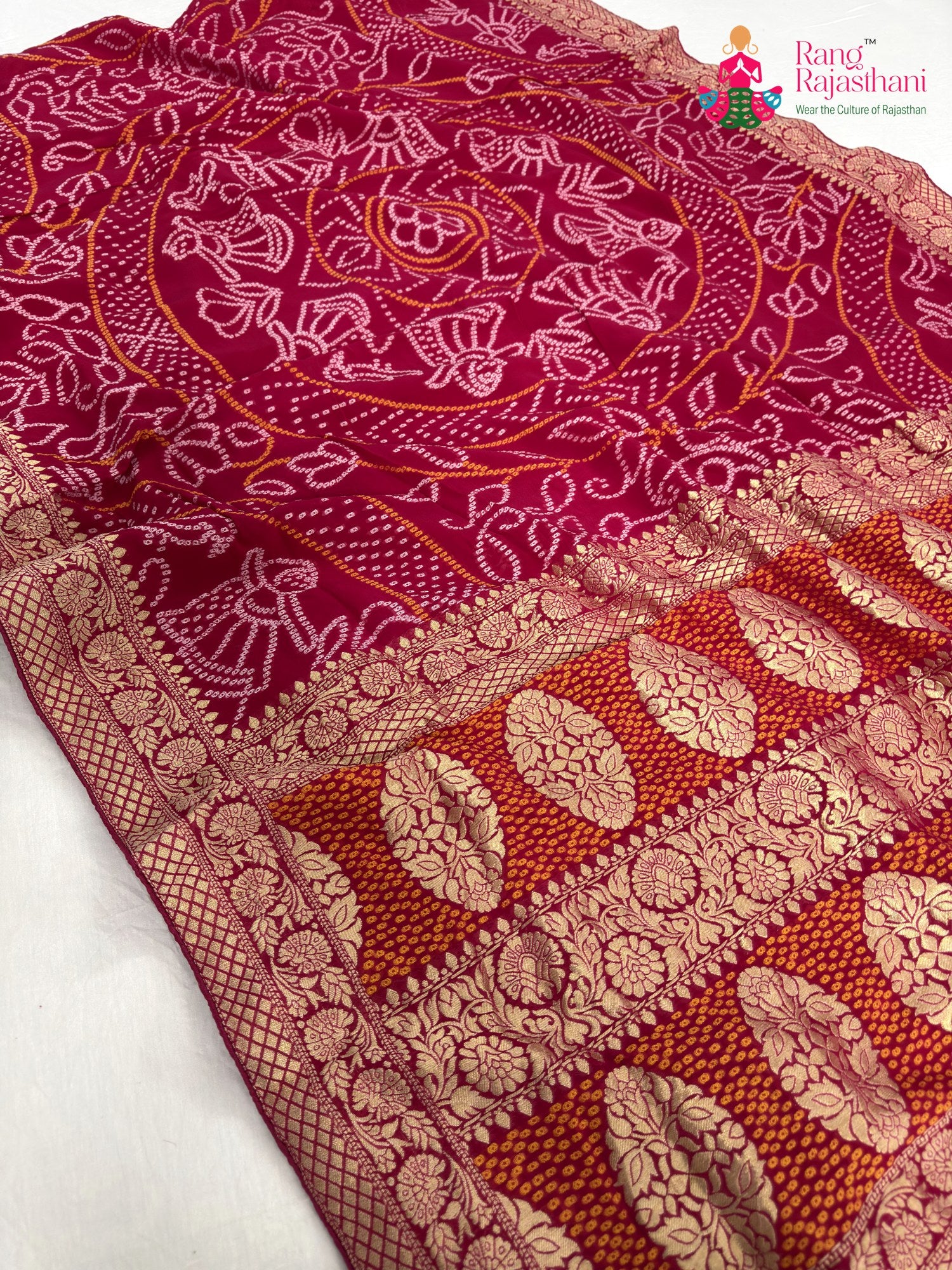 pallu detailing of rani soft georgette bandhani saree