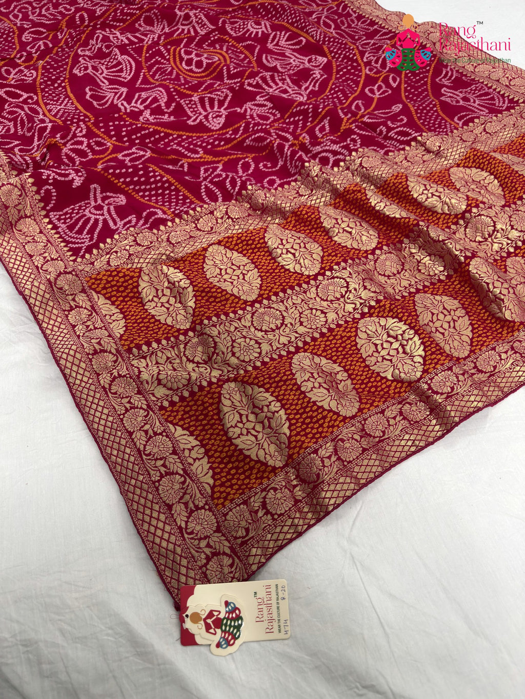 close up detailing of rani soft georgette bandhani saree