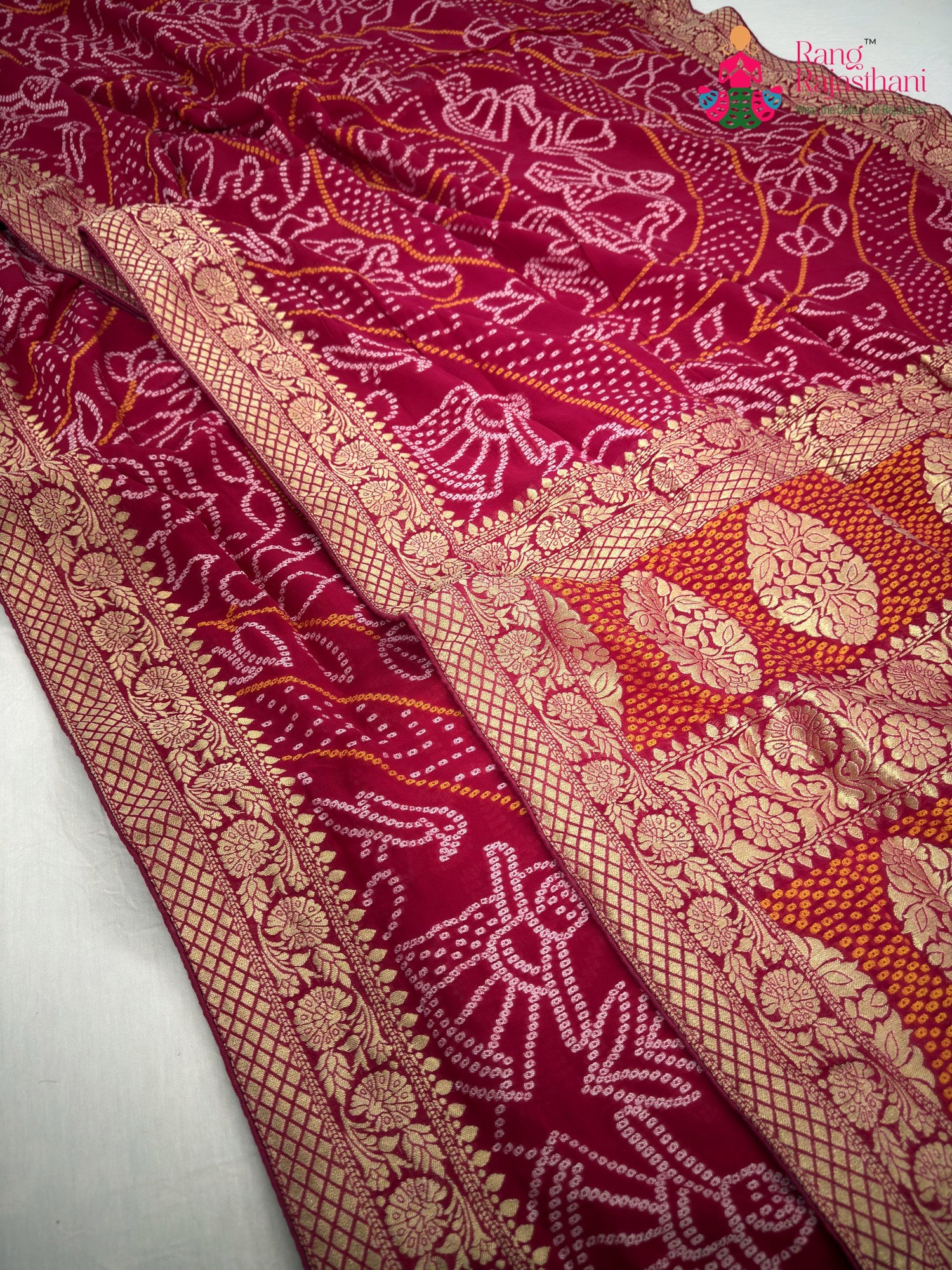 border detailing of rani soft georgette bandhani saree