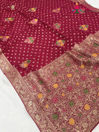 close up detailing of rani soft georgette meenakari zari saree