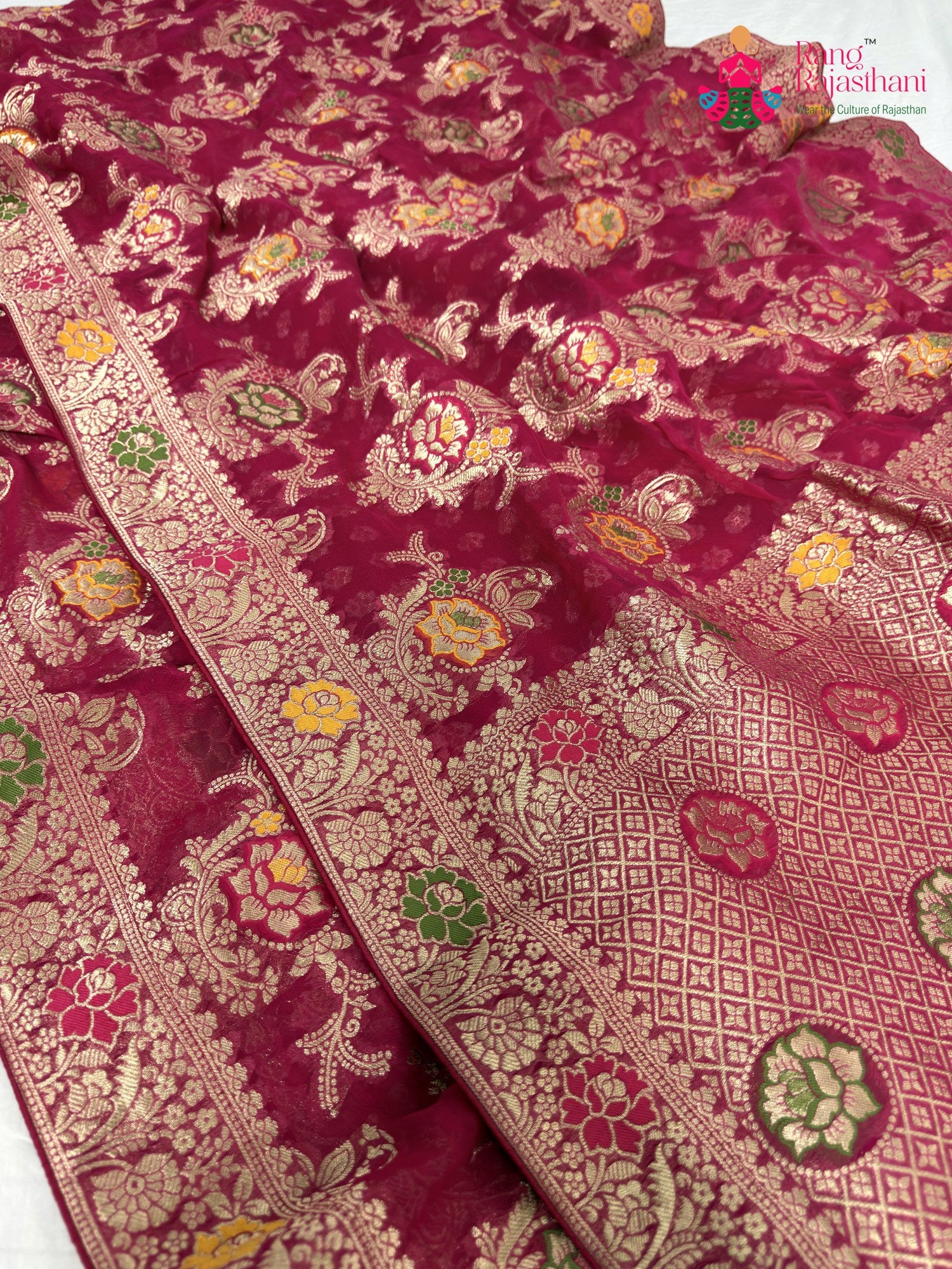 border detailing of rani soft georgette meenakari zari saree