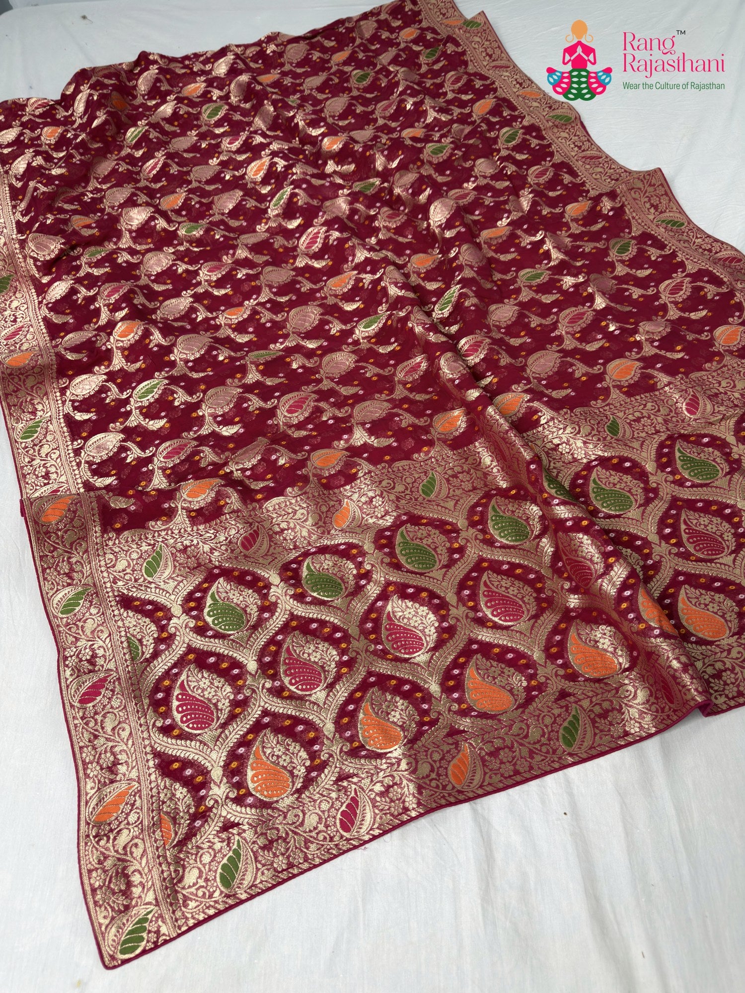 pallu detailing of rani soft georgette meenakari zari saree