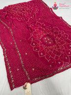 close up detailing of rani synthetic bandhani saree