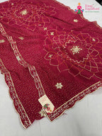 border detailing of rani synthetic bandhani saree