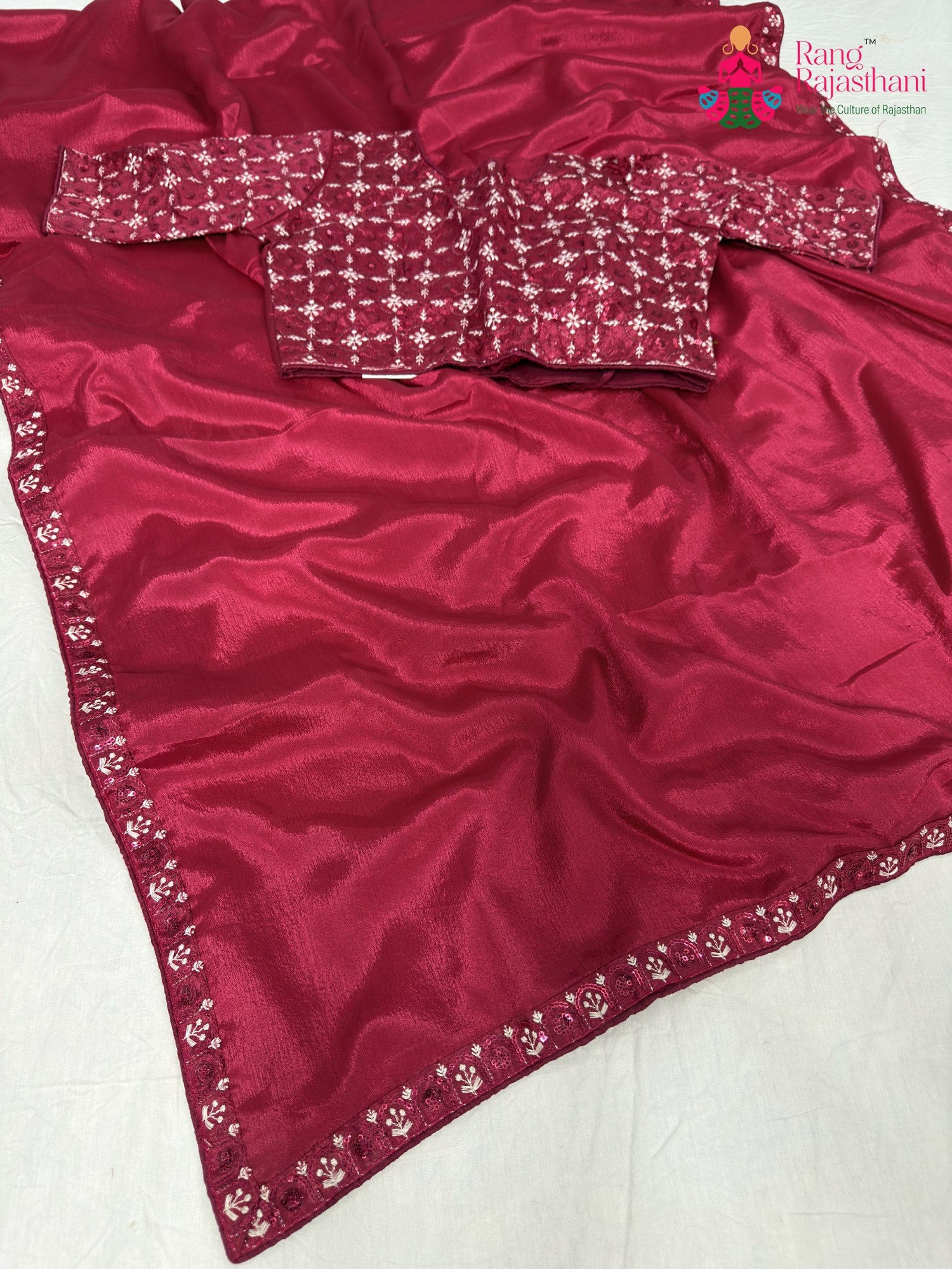 close up detailing of rani synthetic resham embroidery saree