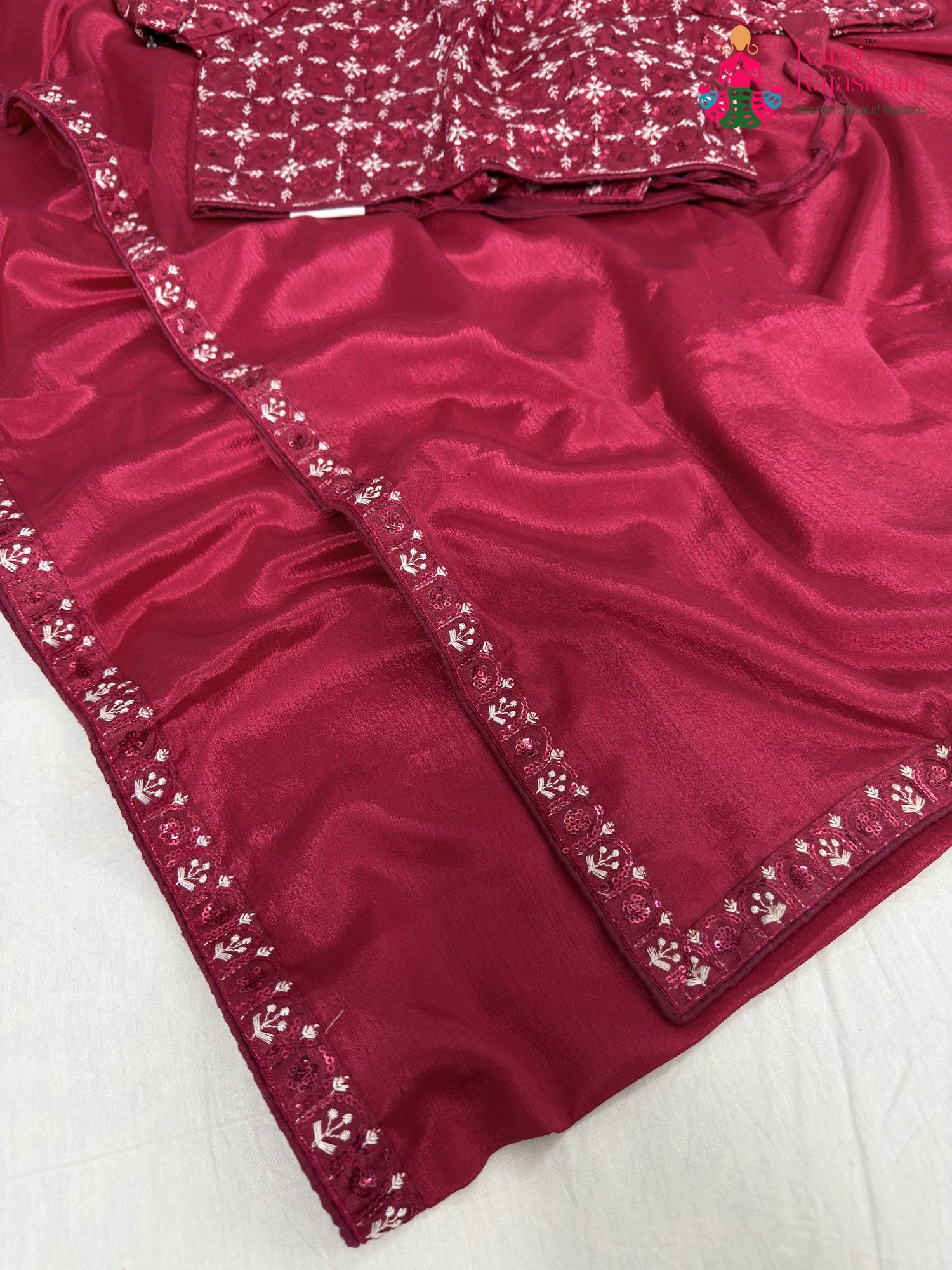 border detailing of rani synthetic resham embroidery saree