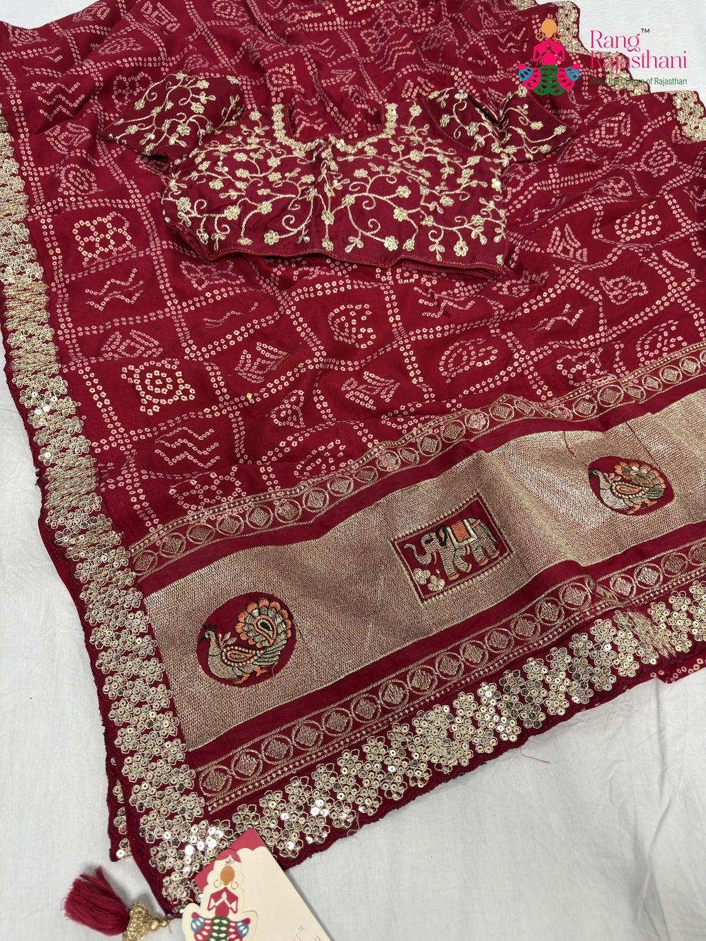 close up detailing of rani synthetic zari embroidery saree