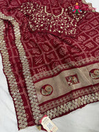 border detailing of rani synthetic zari embroidery saree